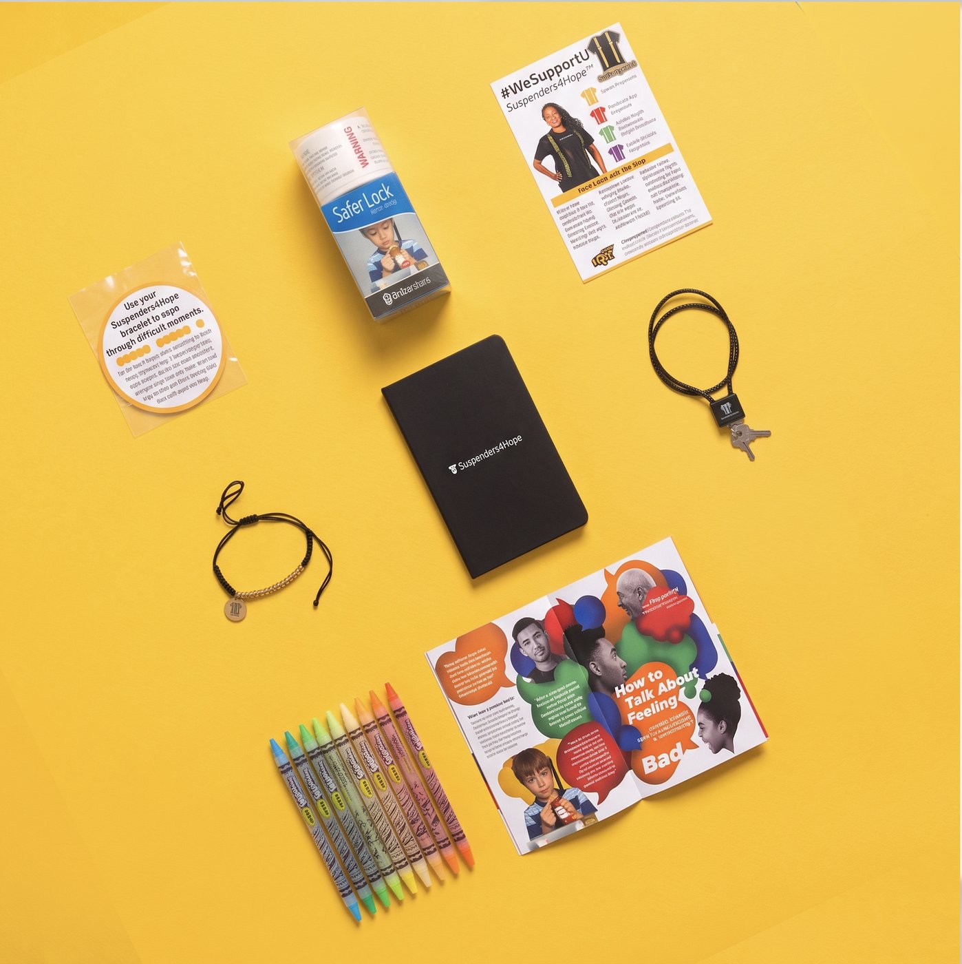 Everything inside a Suspenders4Hope® Starter Kit laid out together