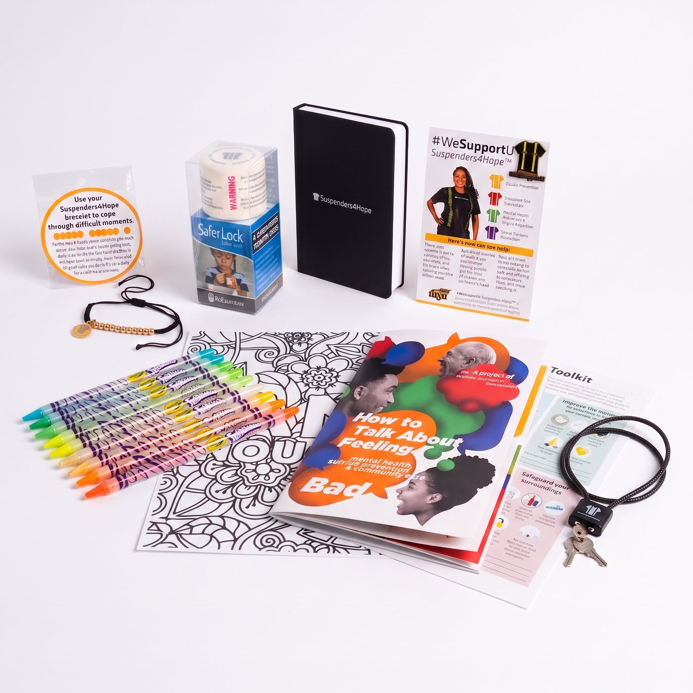 Everything inside a Suspenders4Hope® Starter Kit: a journal, a Safer Lock medication cap, washable crayons and a coloring sheet, a How to Talk About Feeling Bad resource guide, a #WeSupportU flyer, a beaded bracelet, and a keychain cable lock
